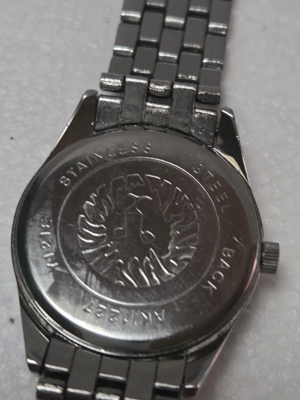 Anne Klein Silver Bracelet Watch with Black Dial And Diamond Accent